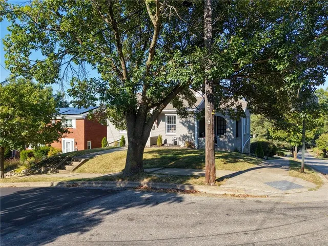 a sign broad on the side of the road