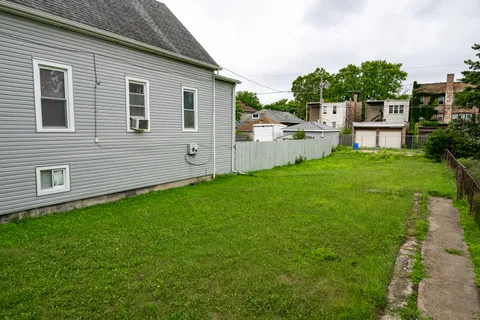 a front view of a house with yard