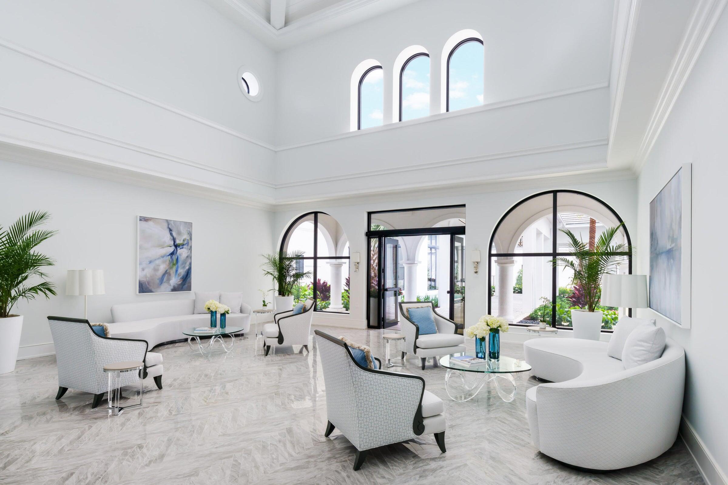 2202 Northwest 60th Street Boca Raton, FL 33496 - Photo 5 of 13 a living room with furniture and a large window