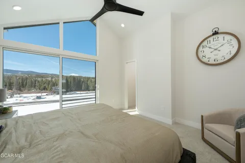 a view of a big room with windows