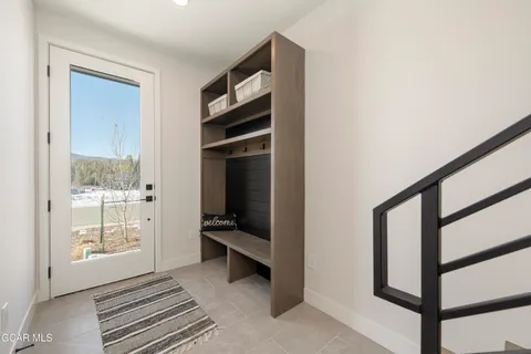 a view of room with walk in closet and a window