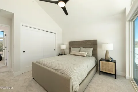 a bedroom with a bed and a cabinets