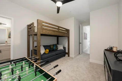 a bedroom with bunk bed