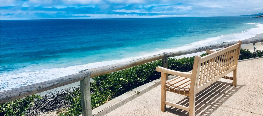 22 Breakers Dana Point, CA 92629 - Photo 13 of 35 a view of a chair and table on the wooden floor
