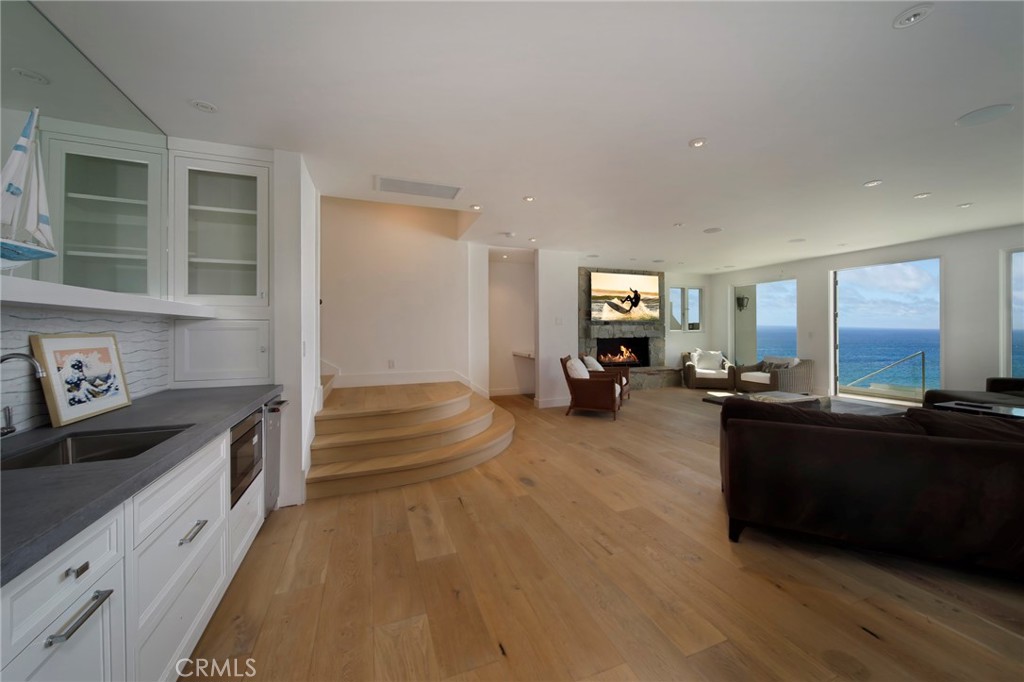 22 Breakers Dana Point, CA 92629 - Photo 9 of 35 a large kitchen with granite countertop lots of counter top space