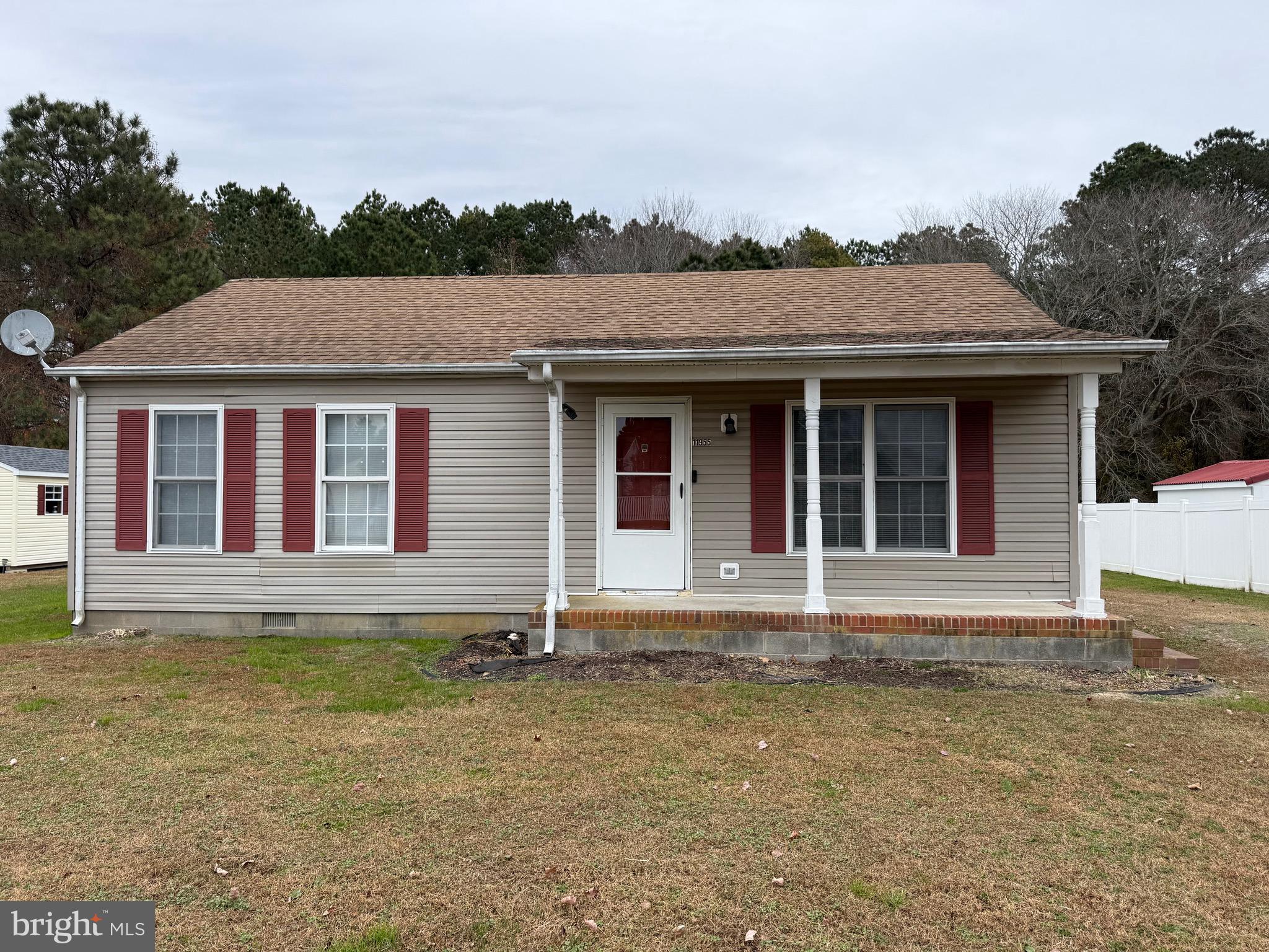 11955 Robyn Lane Princess Anne, MD 21853 - Photo 1 of 12 a house with a garden