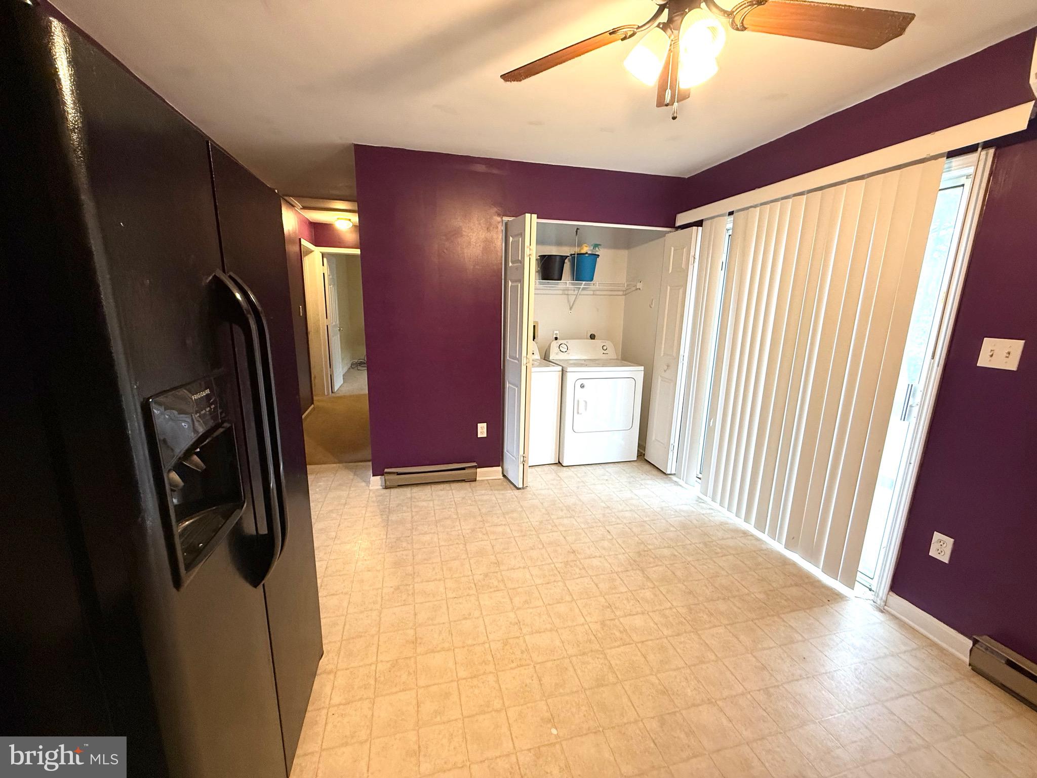 11955 Robyn Lane Princess Anne, MD 21853 - Photo 12 of 12 a view of livingroom with hardwood floor and a ceiling fan
