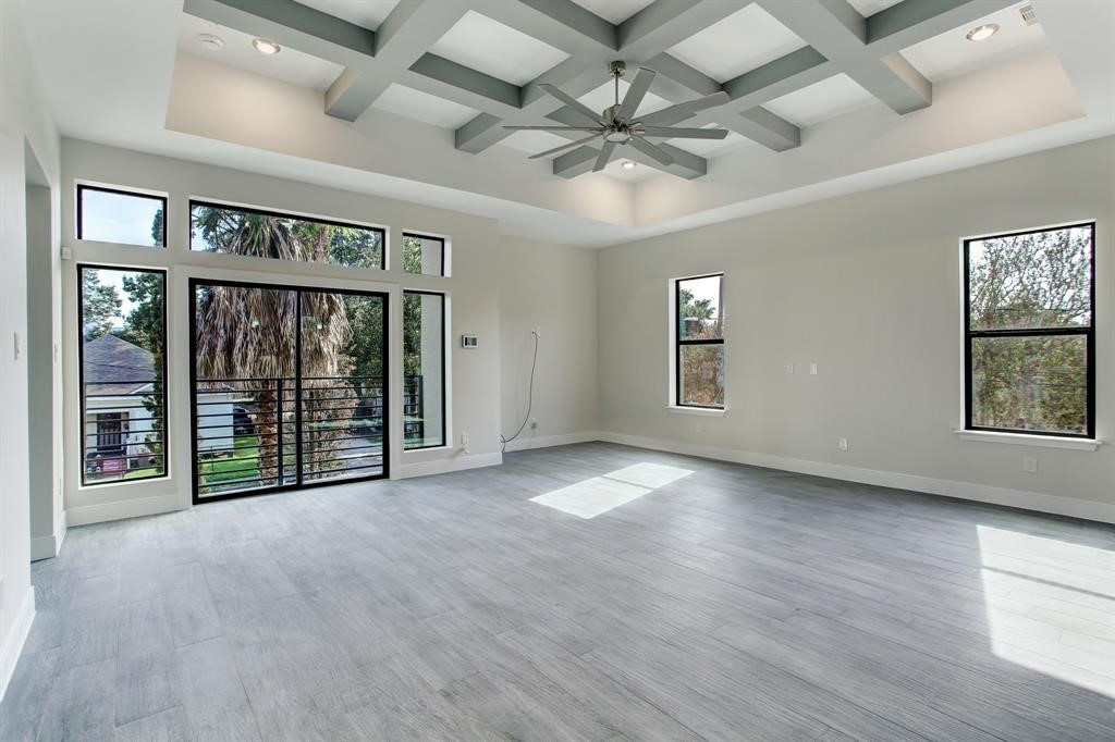 3106 Eunice Street Houston, TX 77009 - Photo 3 of 16 a view of an empty room with a window and a ceiling fan