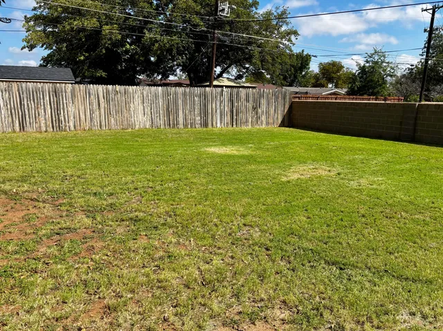 a view of an outdoor space and swimming pool
