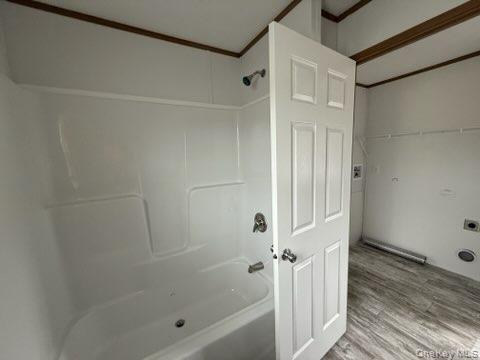 3146 Rte 9W, Unit 5A New Windsor, NY 12553 - Photo 15 of 20 Bathroom featuring bathtub / shower combination and wood finished floors