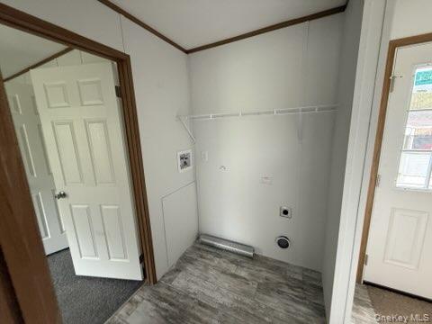 3146 Rte 9W, Unit 5A New Windsor, NY 12553 - Photo 18 of 20 Laundry room with crown molding, laundry area, wood finished floors, and electric dryer hookup