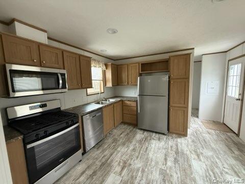 3146 Rte 9W, Unit 5A New Windsor, NY 12553 - Photo 8 of 20 Kitchen with a healthy amount of sunlight, stainless steel appliances, and light wood-type flooring