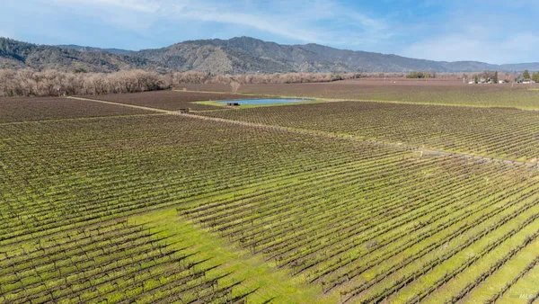 a view of an ocean and a mountain