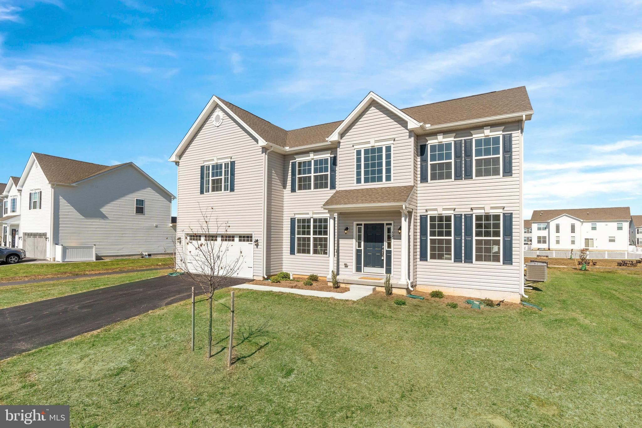50 Wheatstone Way Dover, DE 19904 - Photo 1 of 30 a front view of a house with a yard