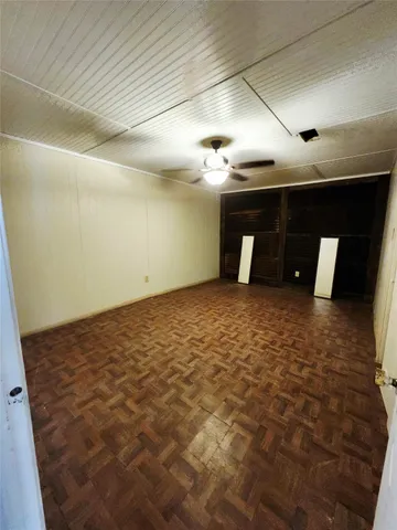 a big room with wooden floor