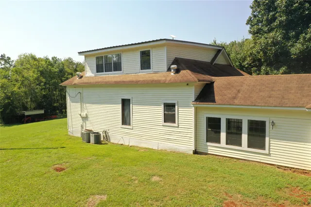 a swimming pool with wooden fence