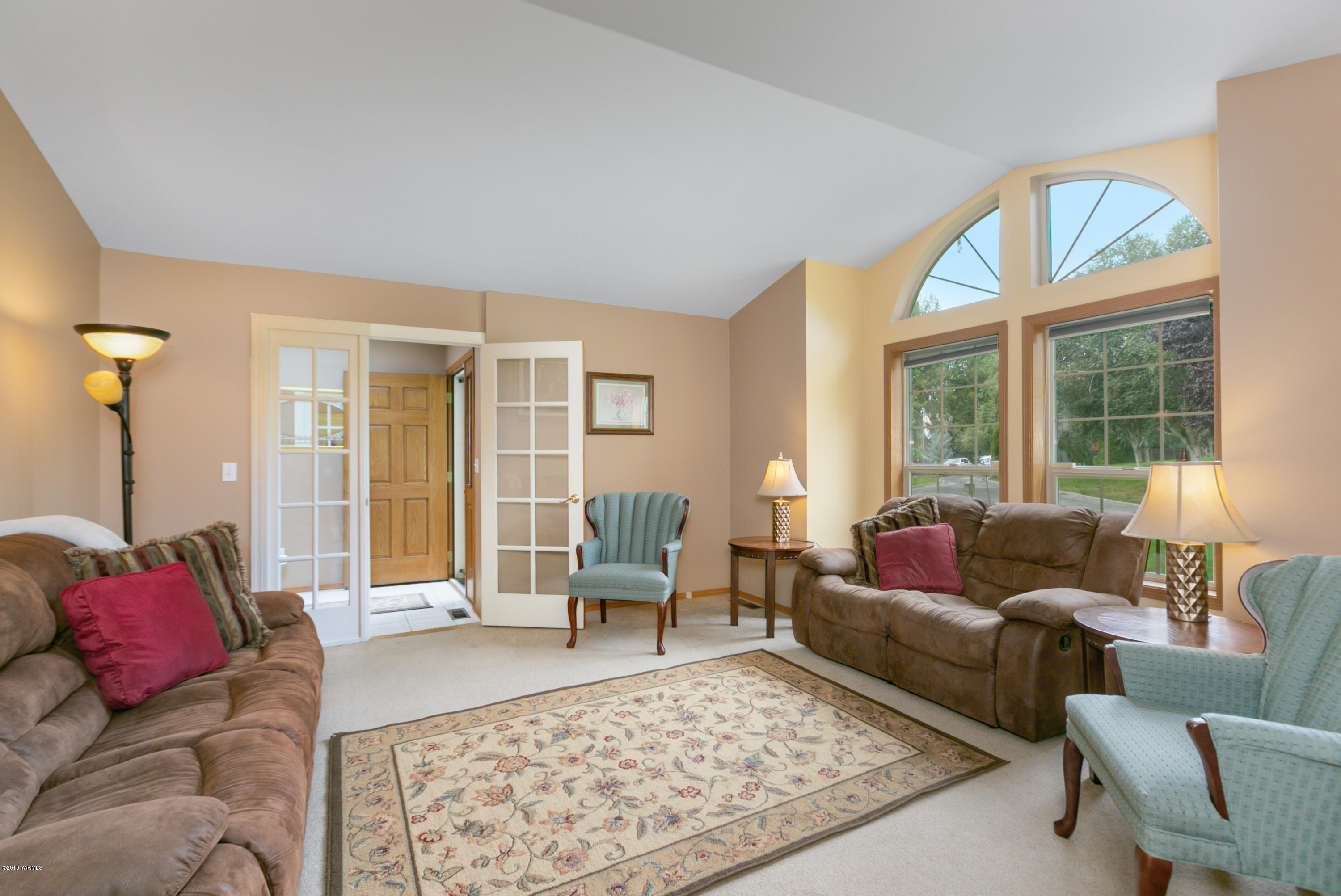 10501 Summitview Road Yakima, WA 98908 - Photo 4 of 22 a living room with furniture and a large window
