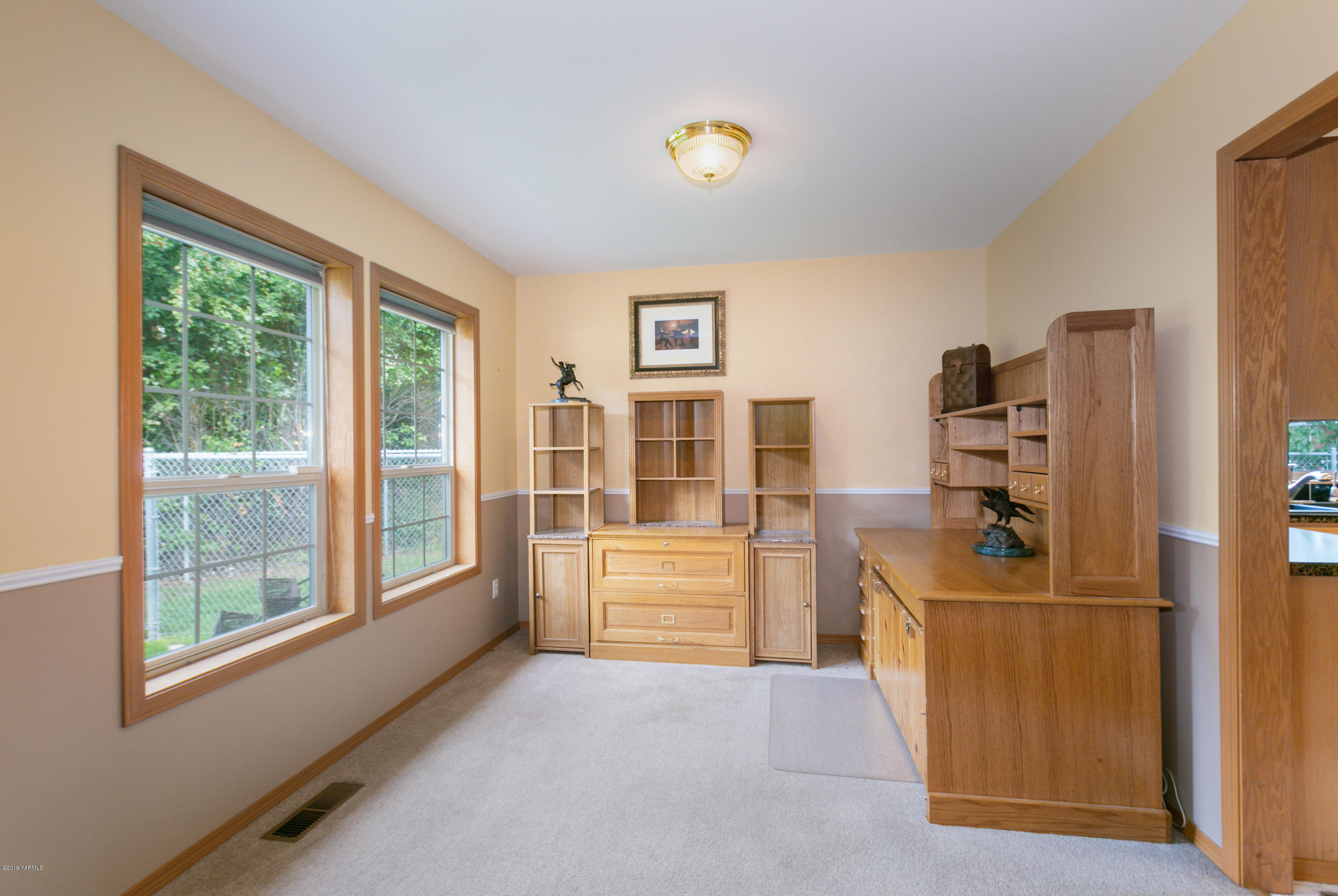 10501 Summitview Road Yakima, WA 98908 - Photo 5 of 22 a view of a living room with furniture and a window
