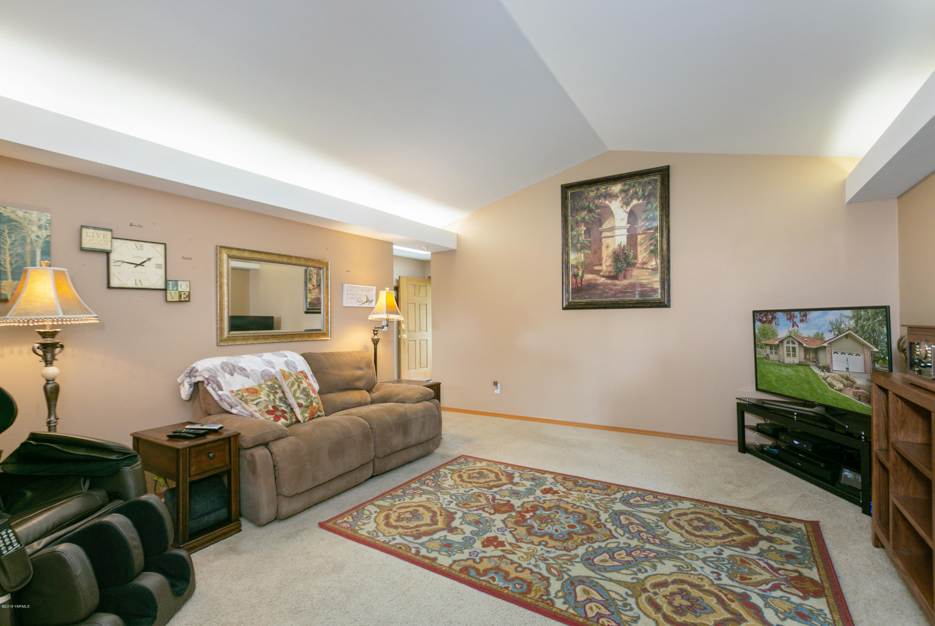 10501 Summitview Road Yakima, WA 98908 - Photo 6 of 22 a bedroom with furniture and a couch