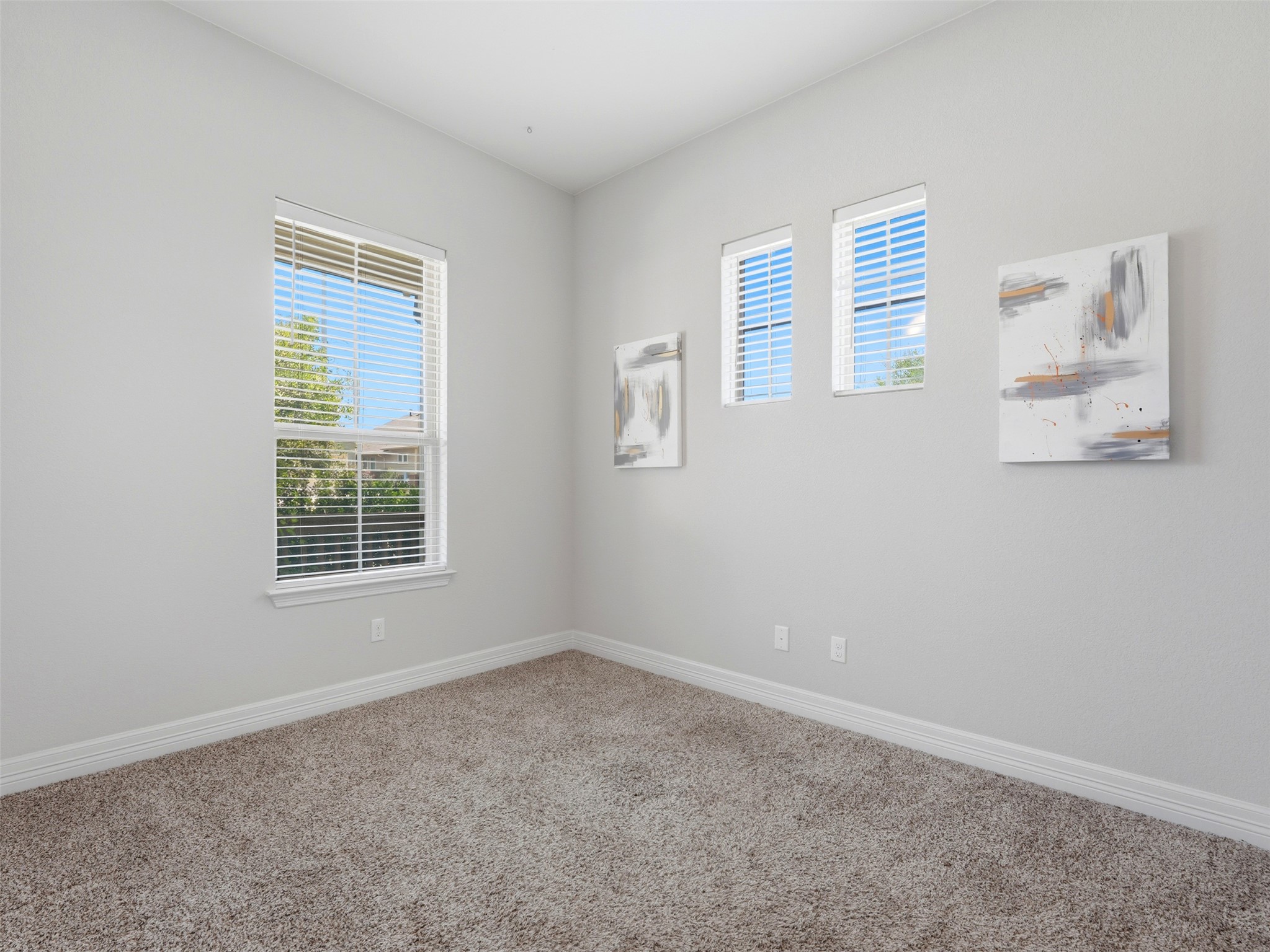 2132 Ringstaff Road Leander, TX 78641 - Photo 19 of 39 Natural light filters into this well-appointed room, offering versatile living options.