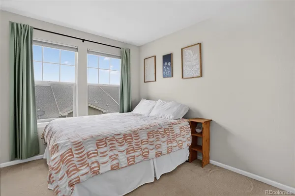 a view of a street from a balcony