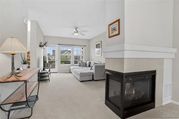 a kitchen with a sink appliances and cabinets