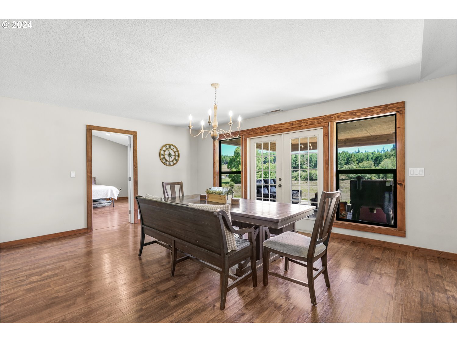 70200 Apiary Road Rainier, OR 97048 - Photo 13 of 37 a dining room with furniture and wooden floor