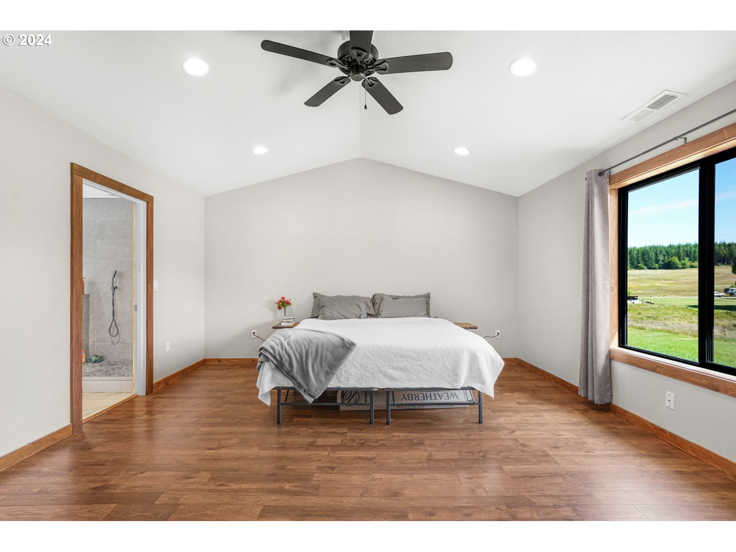 70200 Apiary Road Rainier, OR 97048 - Photo 15 of 37 a bedroom with a bed and a window