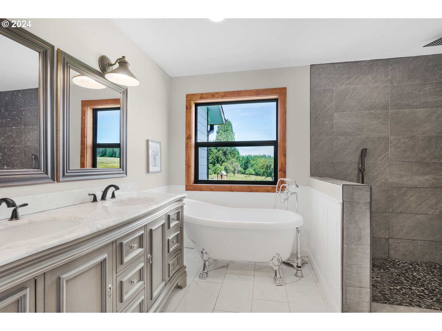 70200 Apiary Road Rainier, OR 97048 - Photo 17 of 37 a bathroom with a sink and a bathtub