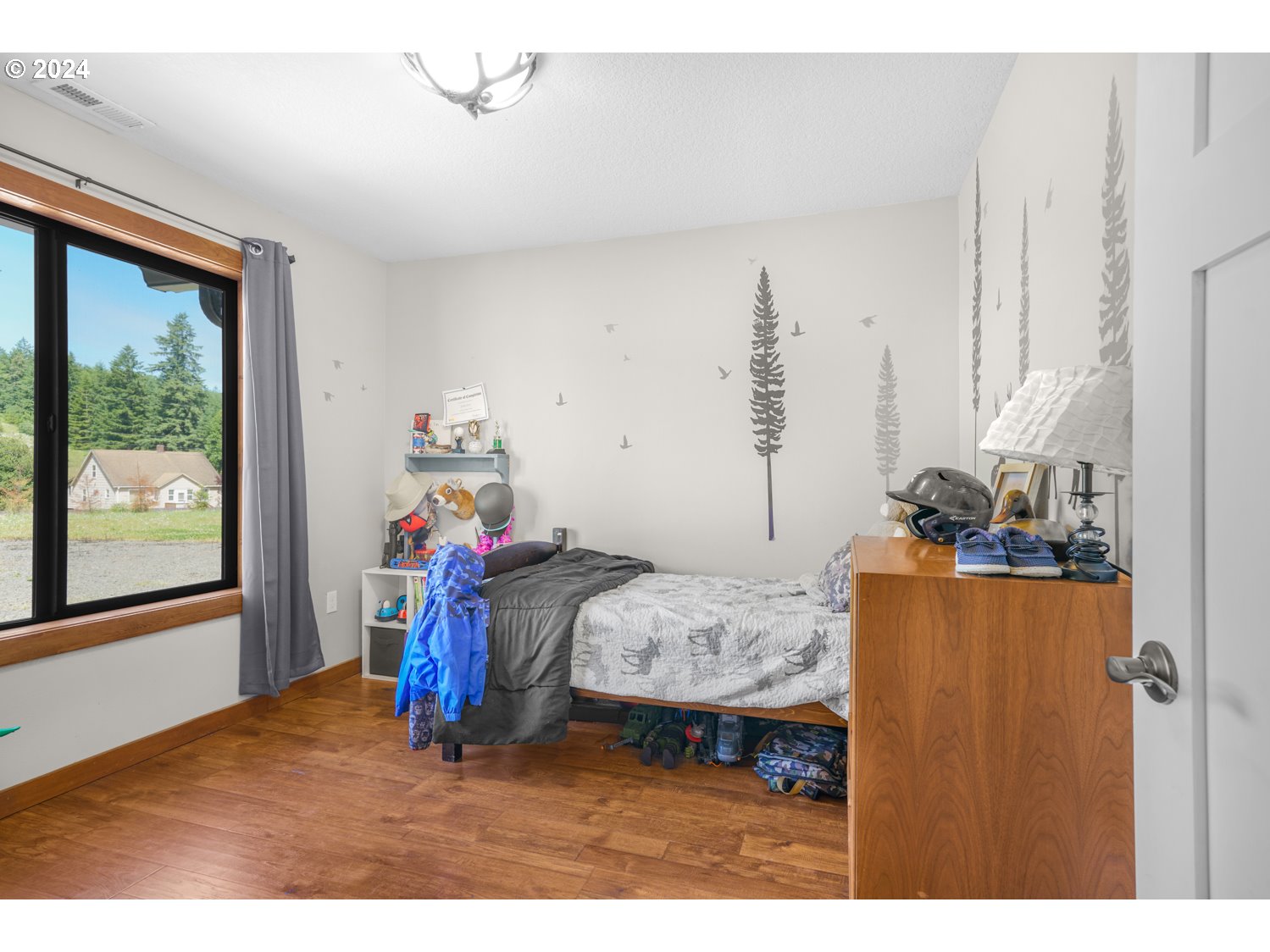 70200 Apiary Road Rainier, OR 97048 - Photo 21 of 37 a living room with furniture and a window