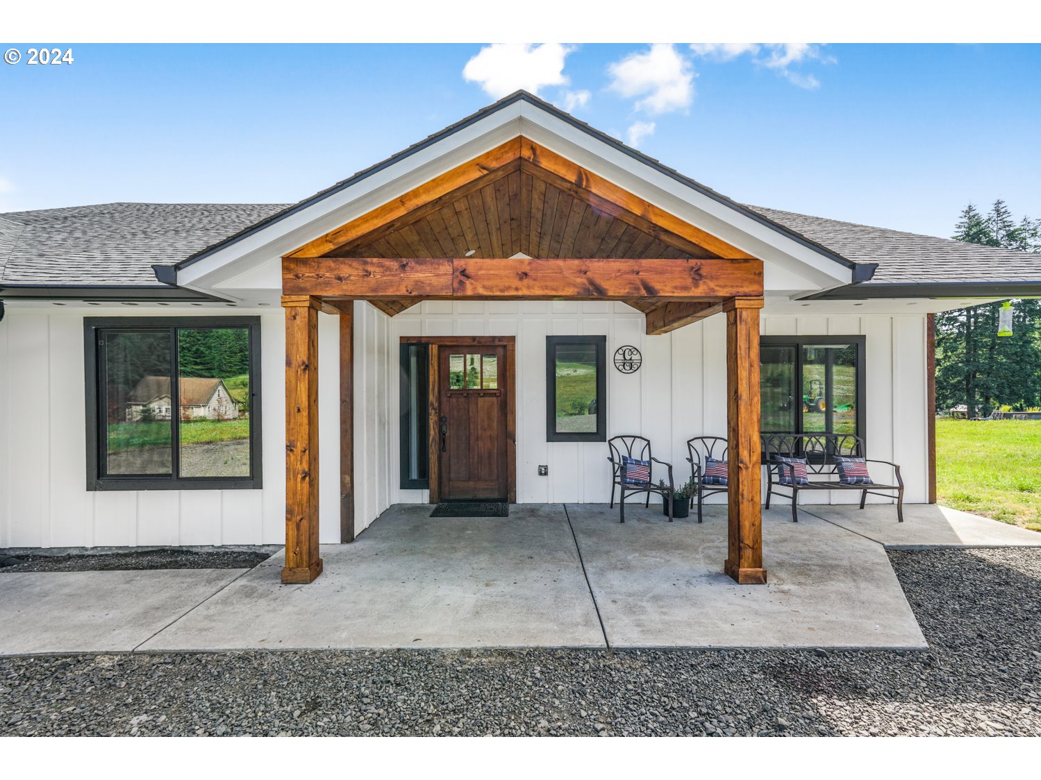 70200 Apiary Road Rainier, OR 97048 - Photo 26 of 37 a view of a house with a porch