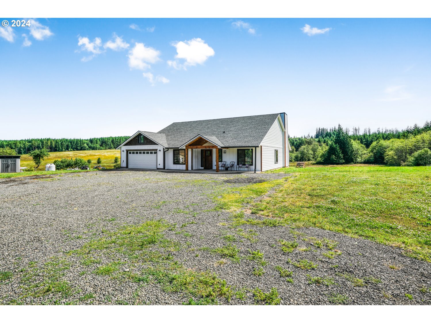 70200 Apiary Road Rainier, OR 97048 - Photo 29 of 37 a house view with a garden space