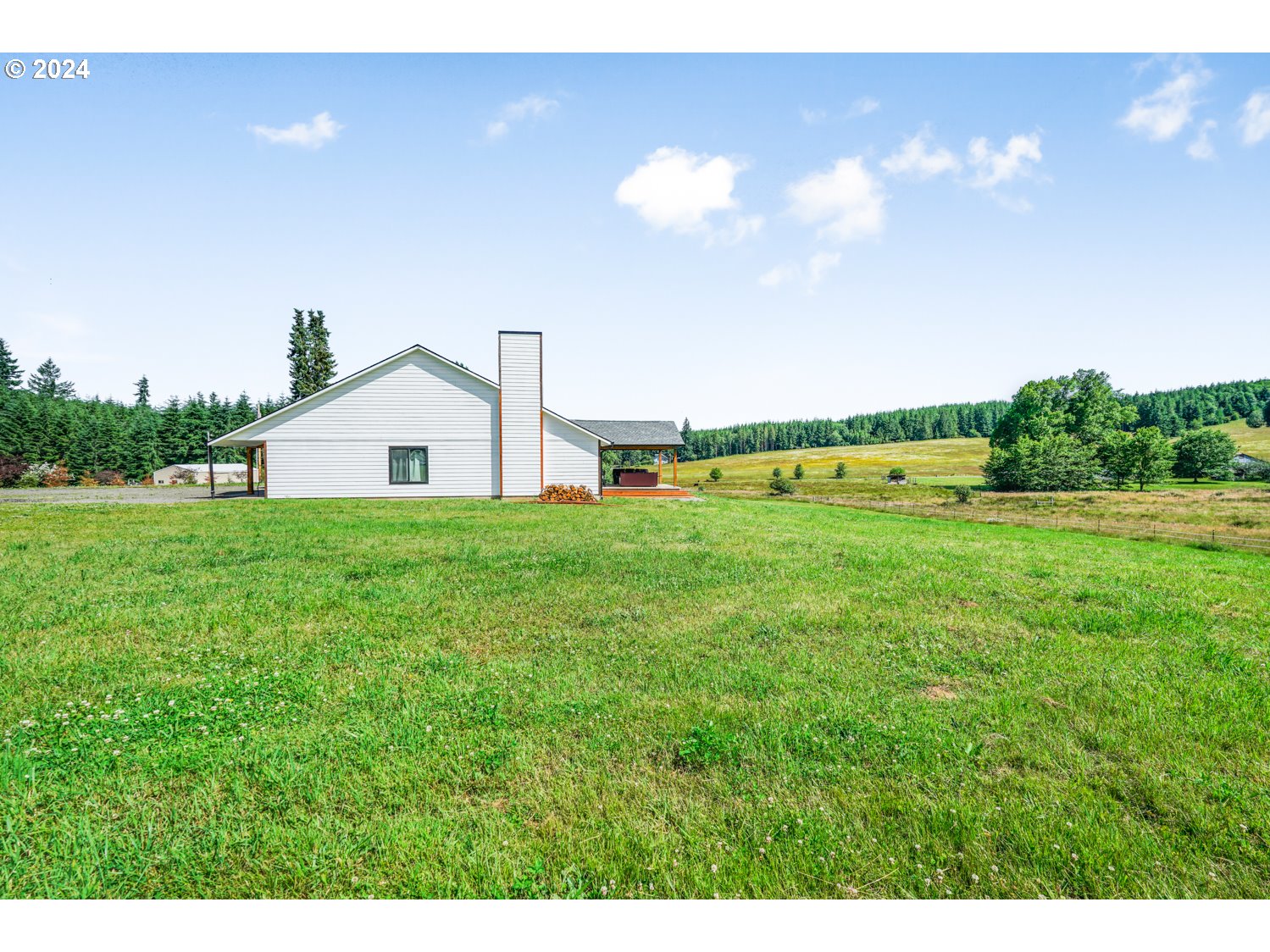 70200 Apiary Road Rainier, OR 97048 - Photo 31 of 37 a view of a house with a big yard