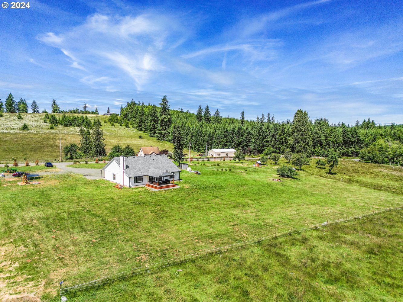 70200 Apiary Road Rainier, OR 97048 - Photo 34 of 37 a backyard of a house with lots of green space