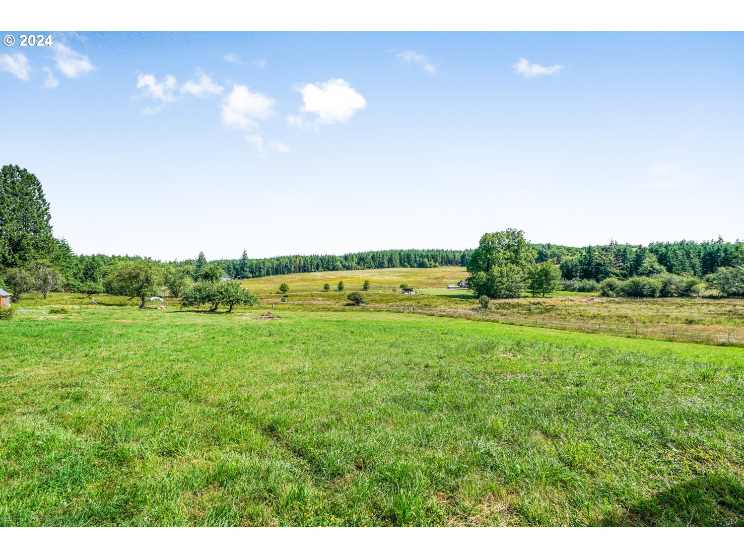 70200 Apiary Road Rainier, OR 97048 - Photo 4 of 37 a view of an outdoor space and a yard