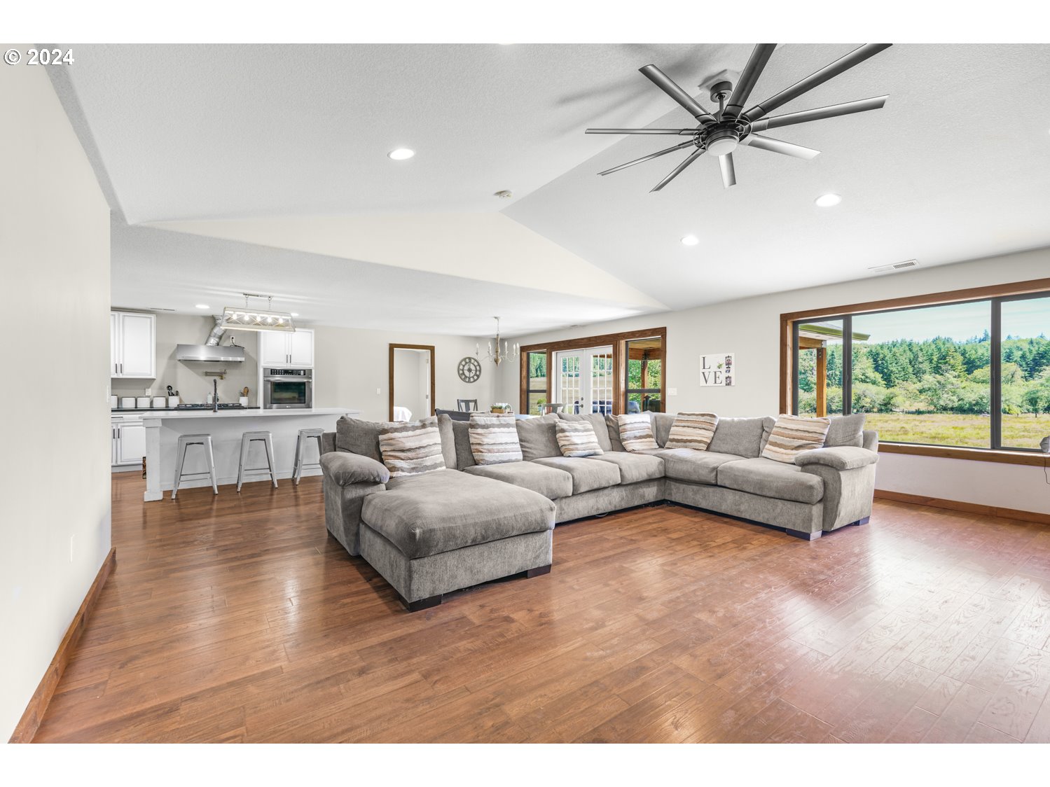 70200 Apiary Road Rainier, OR 97048 - Photo 8 of 37 a living room with furniture and a large window