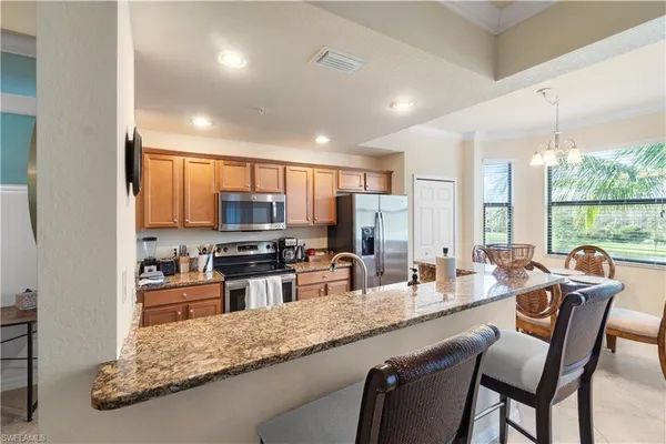 $525,000 | 9727 Acqua Court, Unit 436, Naples, FL 34113