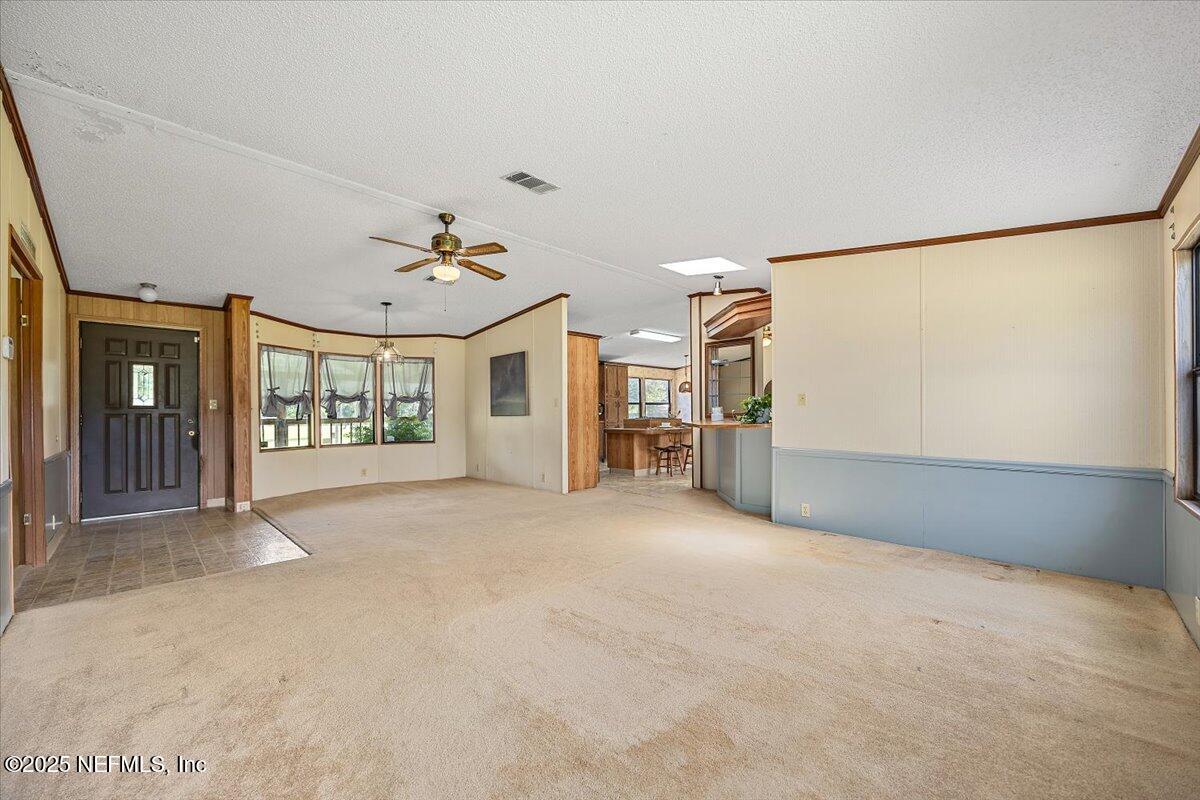 6370 CR 208 St. Augustine, FL 32092 - Photo 8 of 19 a view of a big room with closet and windows