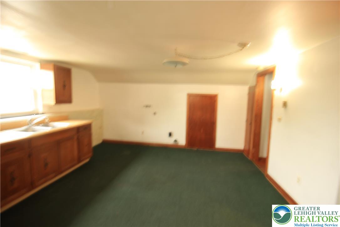 419 Diamond Street, Unit B Slatington, PA 18080 - Photo 5 of 17 a view of an empty room and window