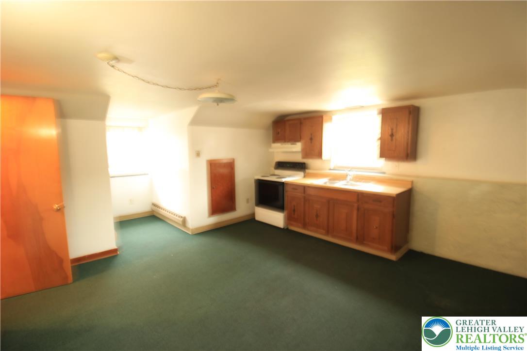 419 Diamond Street, Unit B Slatington, PA 18080 - Photo 6 of 17 a view of a room with washing machine