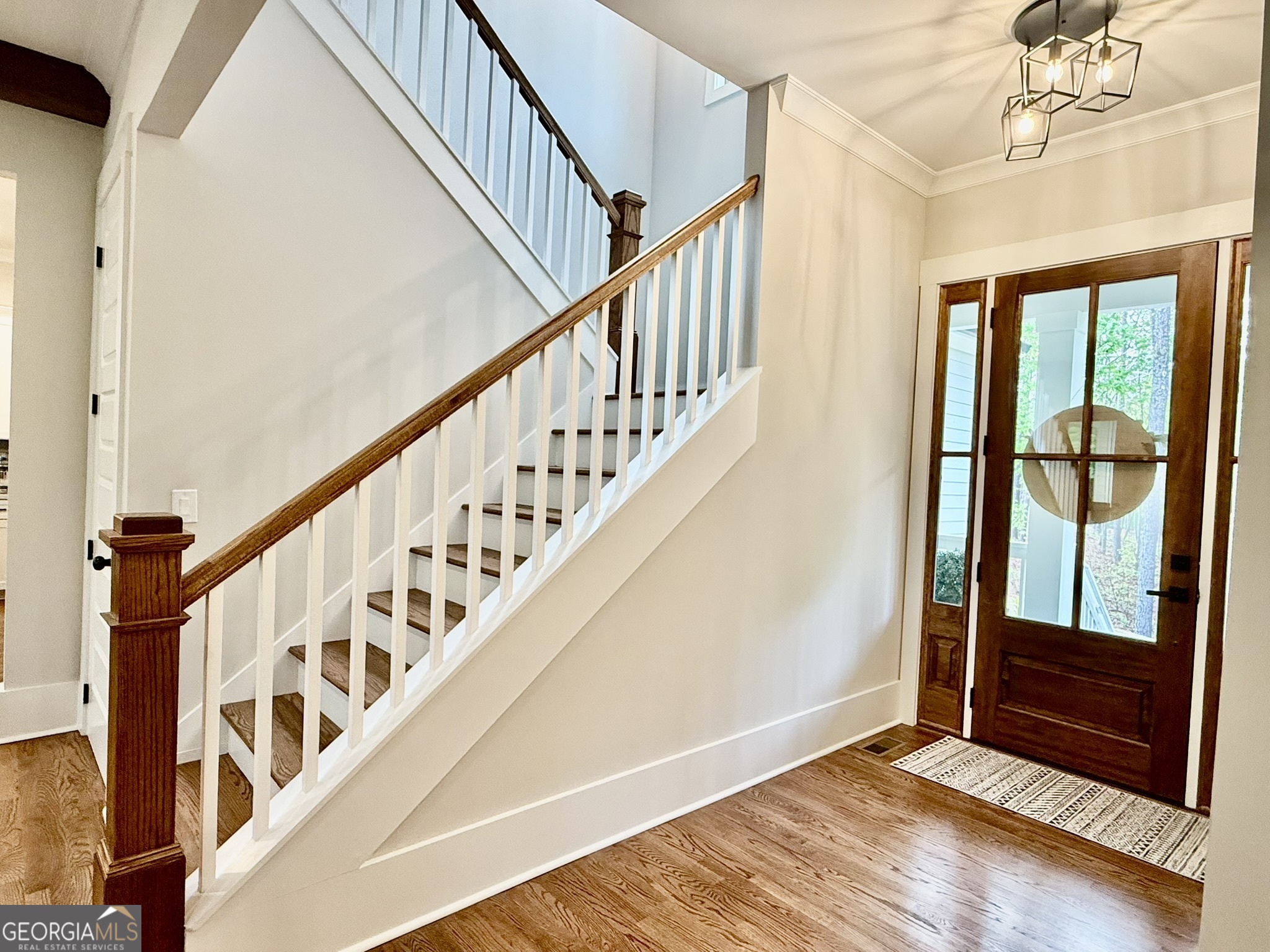 120 Spring Creek Drive Rutledge, GA 30663 - Photo 5 of 38 a view of an entryway with wooden floor