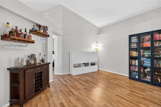 a kitchen with stainless steel appliances granite countertop a stove and cabinets