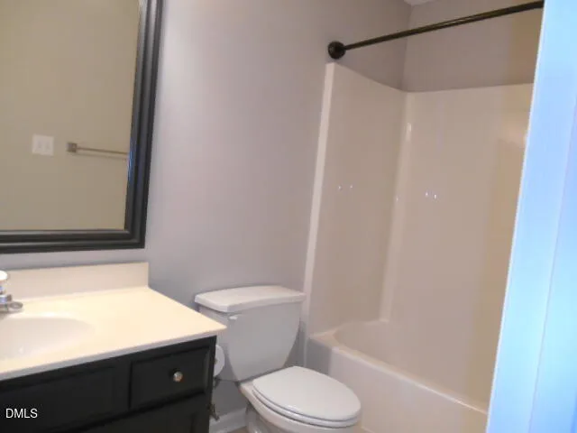 a bathroom with a toilet a sink and a bathtub