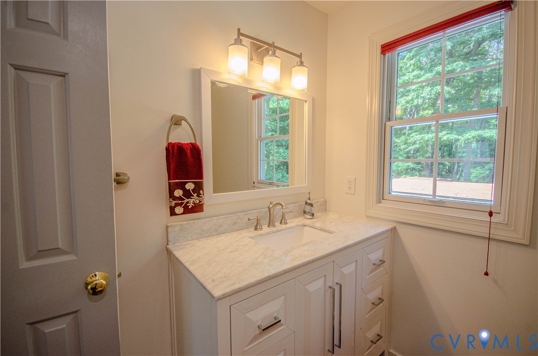12500 Musical Lane Midlothian, VA 23113 - Photo 24 of 51 Bathroom vanity with a light-colored countertop, u