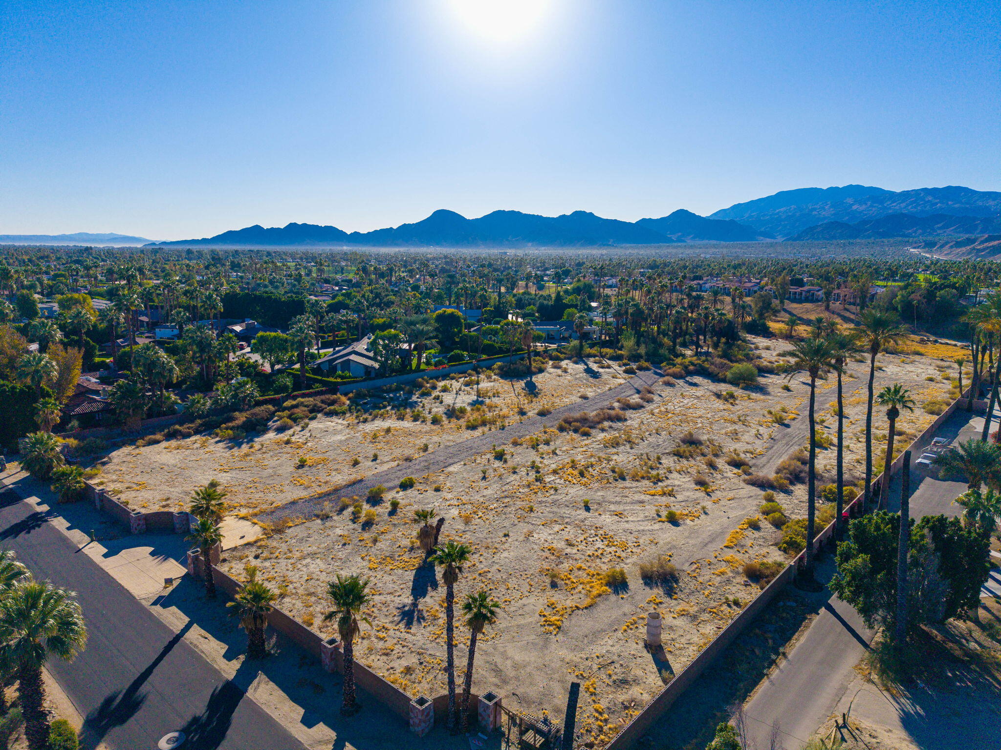 72111 Clancy Lane Rancho Mirage, CA 92270 - Photo 1 of 8 a view of a mountain with a backyard space