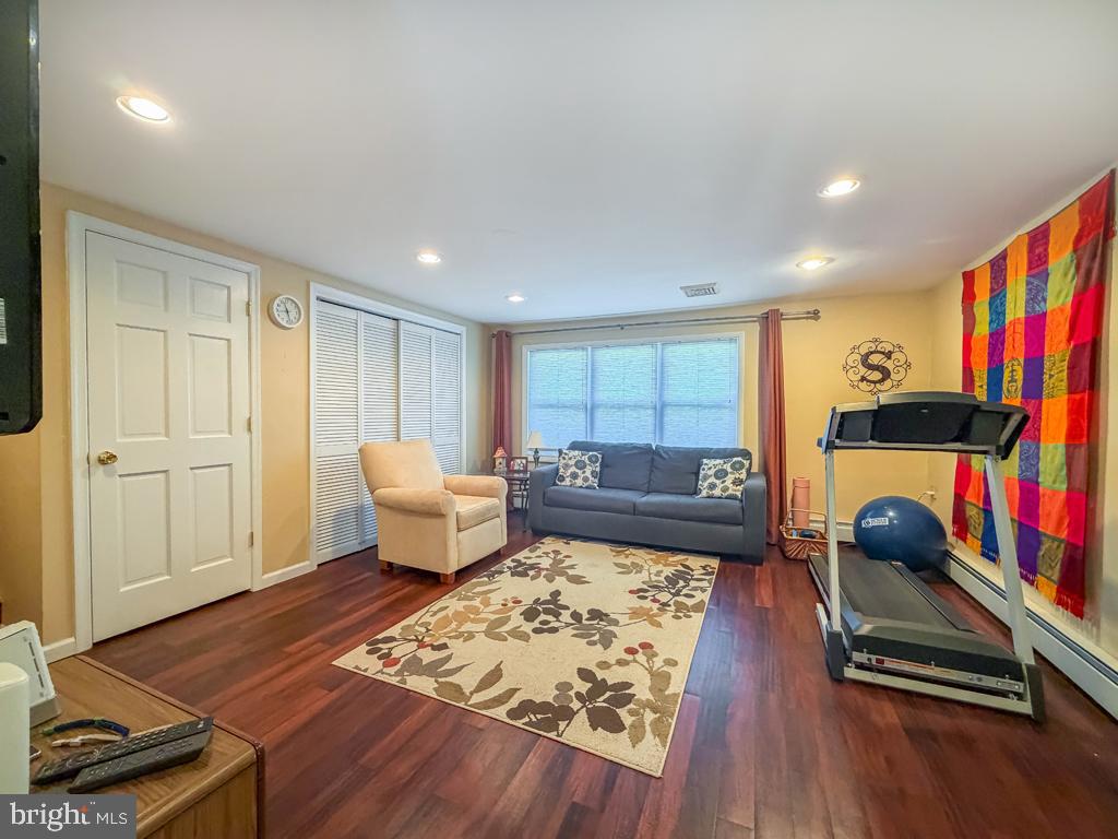925 Big Oak Road Yardley, PA 19067 - Photo 23 of 51 a living room with furniture and a rug