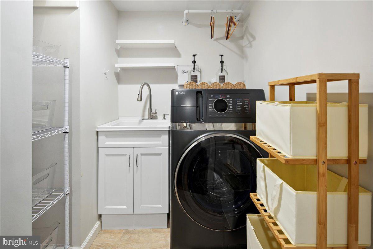 5901 Mt Eagle Drive, Unit 802 Alexandria, VA 22303 - Photo 9 of 52 Laundry room with combo washer/dryer