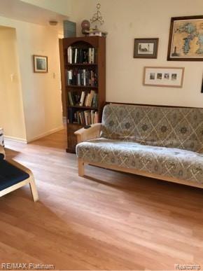 4211 Rurik Drive Howell, MI 48843 - Photo 19 of 25 Familyroom towards stairs and 2 bedrooms