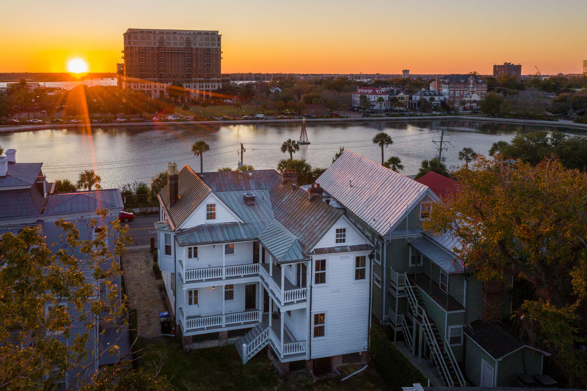 34 Rutledge Avenue Charleston, SC 29401 - Photo 52 of 53 Sunset aerial of lake and home