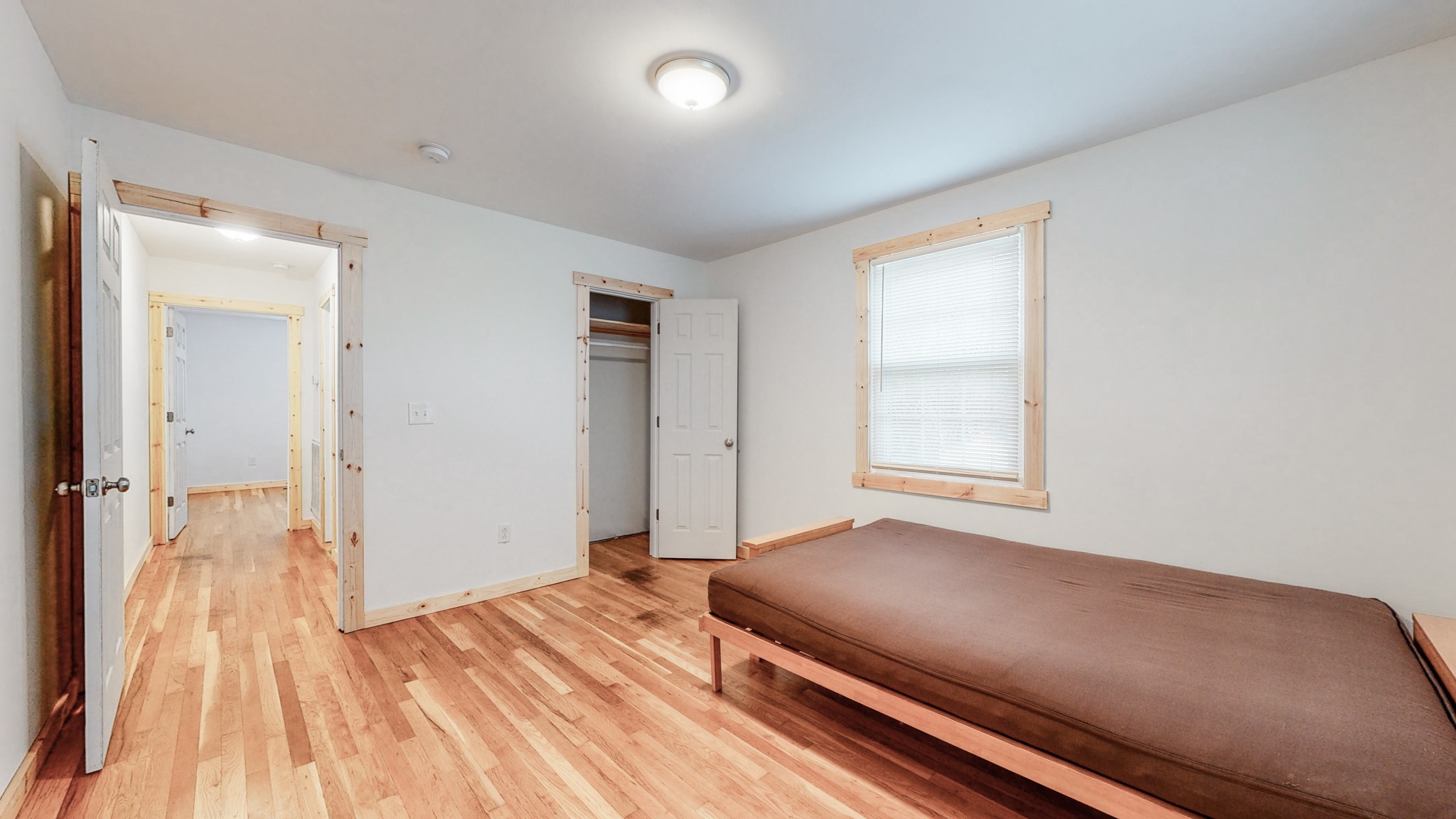 819 Neelys Bend Road Madison, TN 37115 - Photo 14 of 48 a bedroom with a bed and a window
